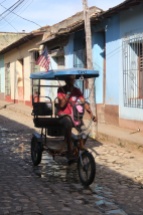 Bici-Taxi die die Touristen herum kutschieren